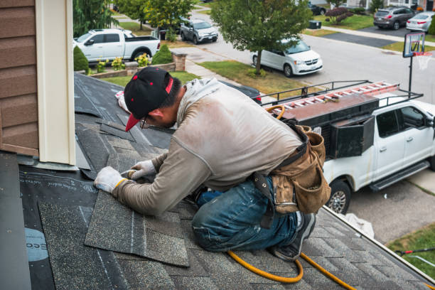 Professional Roof Replacement technician working in South Gardiner, ME